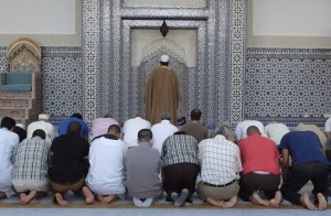 Members of the Muslim community attend midday prayers at Strasbourg Grand Mosque in Strasbourg